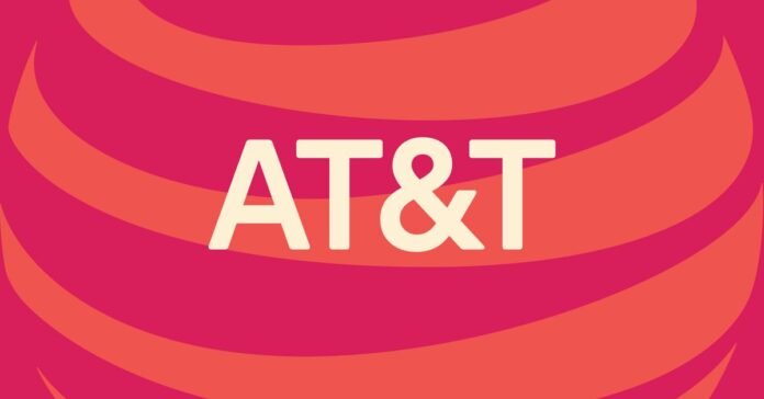 AT&amp;T logo with an illustrated red and orange background.