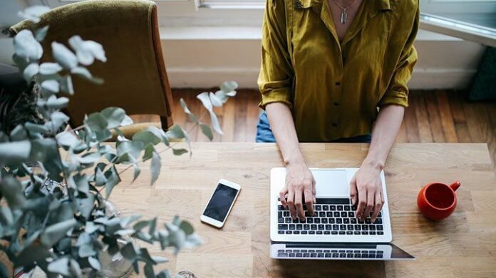 a woman using a laptop