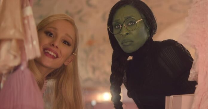 A screenshot from the movie Wicked that features Galinda (Ariana Grande, left) and Elphaba (Cynthia Erivo, right).